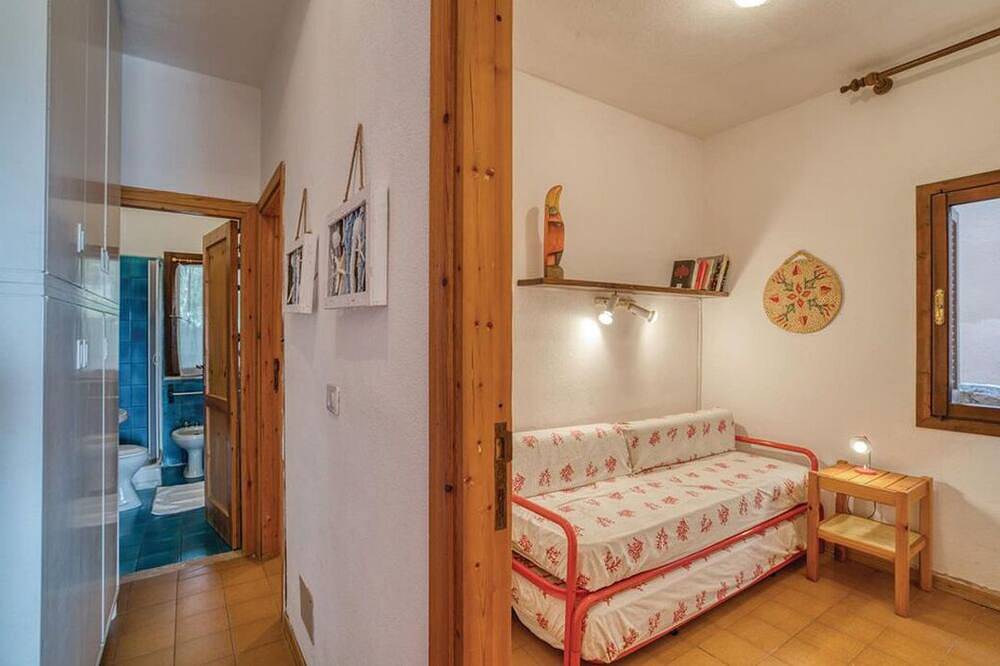 Ganze Wohnung, Schöne Bucht mit weißem Sand und kristallklarem Meer gegenüber der Insel Tavolara in Porto Istana, Gallura