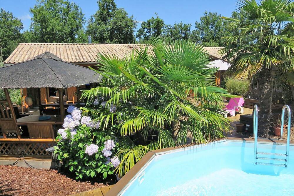 Preciosa casa de vacaciones privada con A/C, piscina privada, Wifi, Tv, patio y aparcamiento in Le Porge, Lesparre-Médoc region
