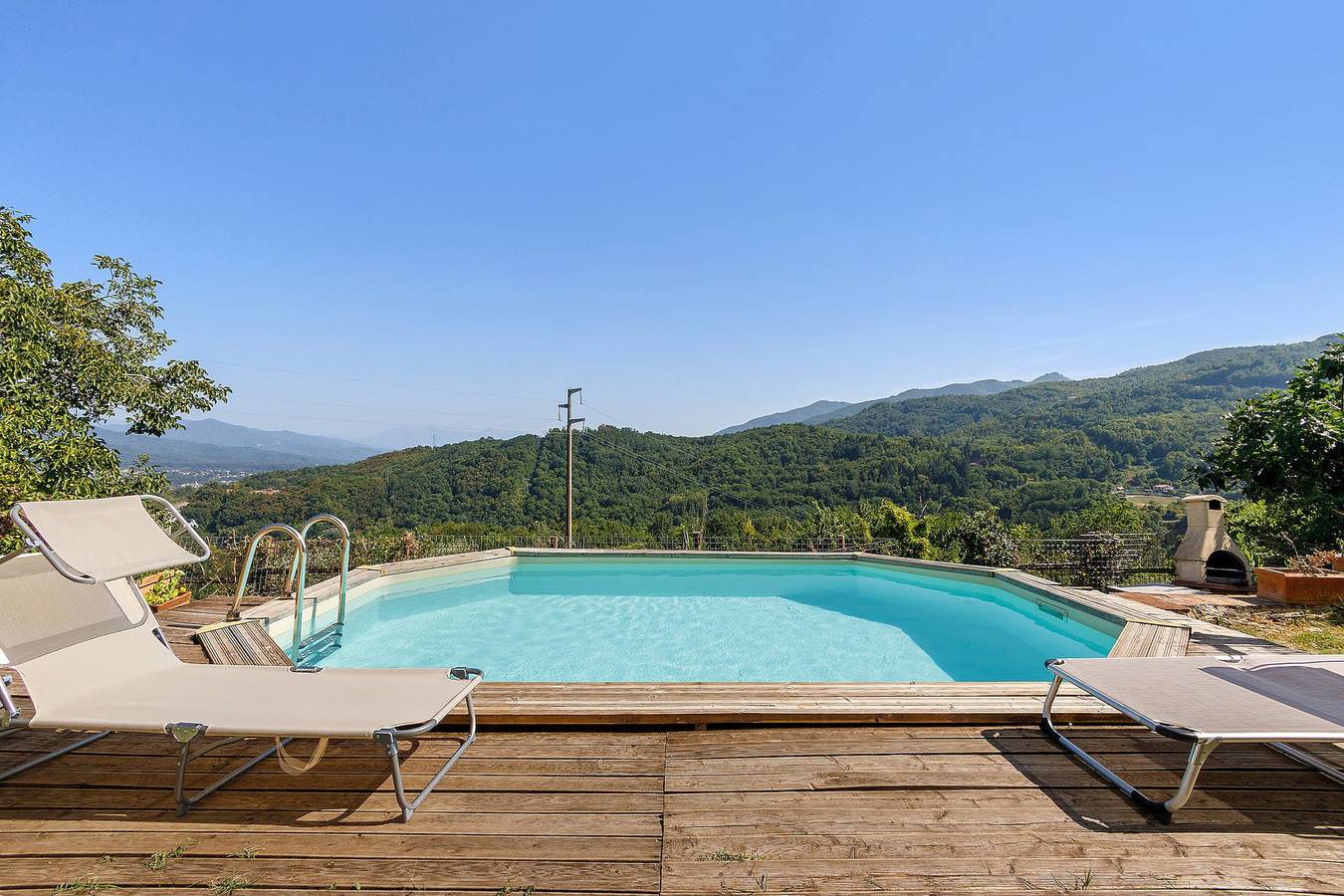 Maison de vacances « Stanza Comodità Piano Terra » avec vue montagne, piscine et jardin partagés in Pontremoli, Val di Magra