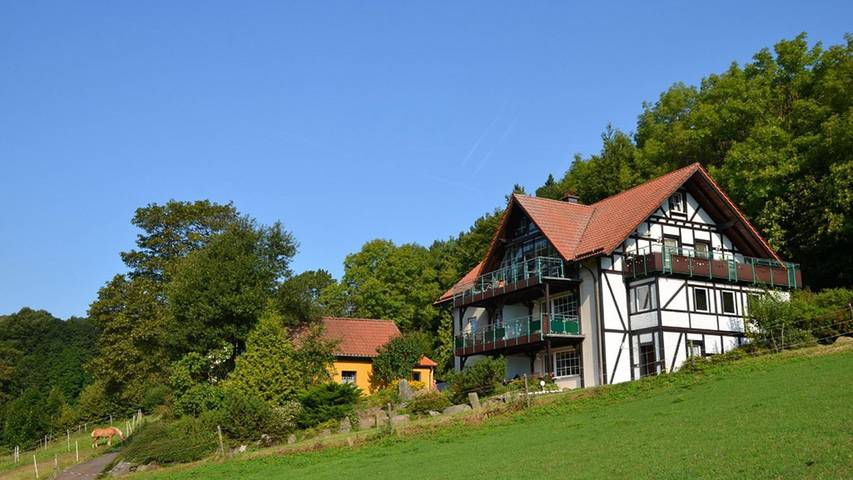 Ferienwohnung für 4 Personen, mit Ausblick und Balkon sowie Garten in Poppenhausen