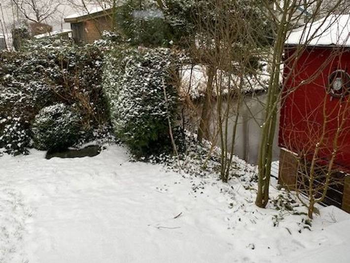 Ferienhaus für 5 Personen, mit Terrasse und Whirlpool sowie Garten und Seeblick in Südbrookmerland