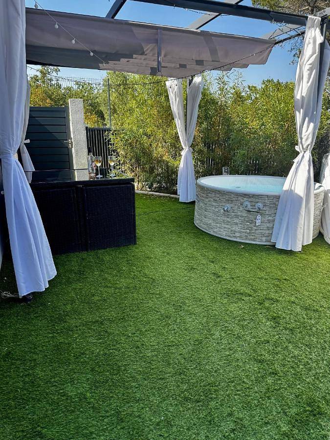 Maison de vacances pour 2 personnes, avec terrasse et jacuzzi
