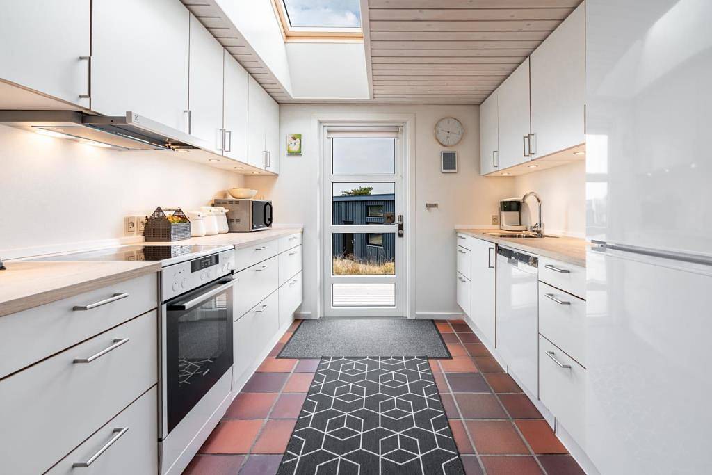 Ferienhaus in Henne Strand mit Sauna, Kamin und überdachter Terrasse in Henne, Filsø See