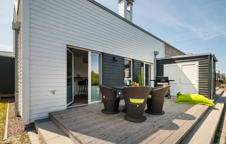 Ferienwohnung für 4 Personen, mit Terrasse und Seeblick sowie Sauna und Garten am Jadebusen