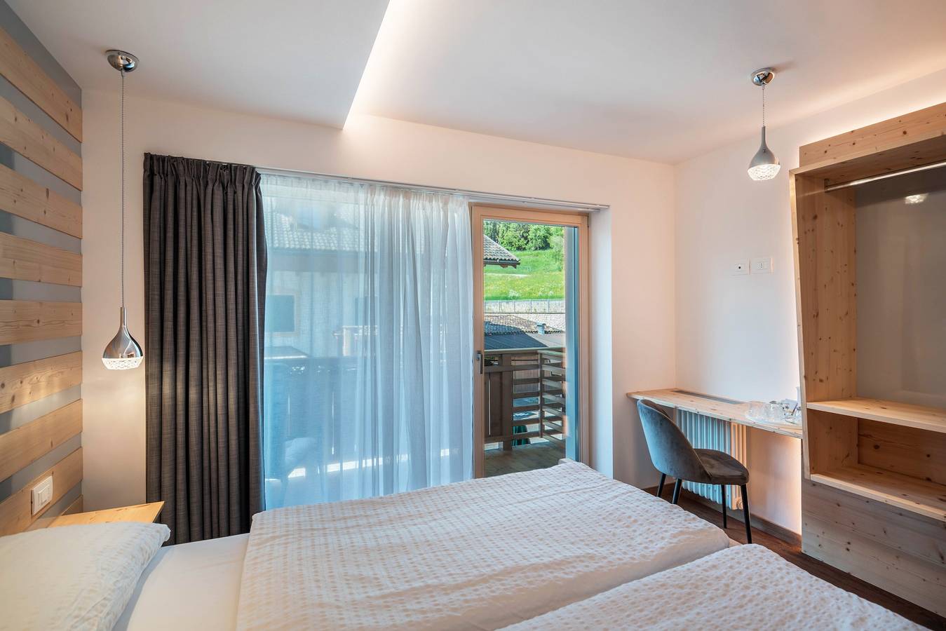 Appartamento intero, Appartamento 'Wellness Alpino Con Minispa' con vista sulle montagne, terrazza condivisa e Wi-Fi in Soraga, Dolomiti Superski