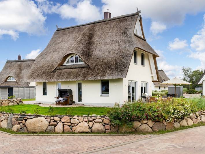 Ferienhaus für 7 Personen, mit Terrasse und Garten sowie Sauna und Seeblick am Salzhaff