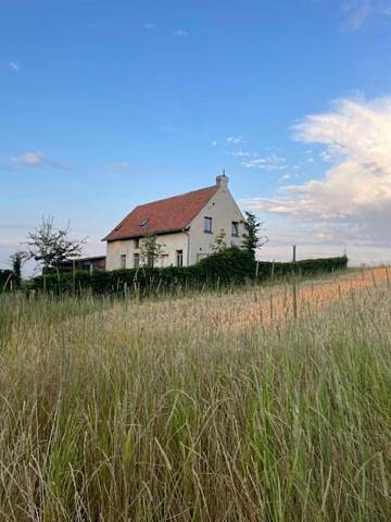 Location de vacances pour 7 personnes, avec terrasse et vue ainsi que sauna et jardin à Ellezelles
