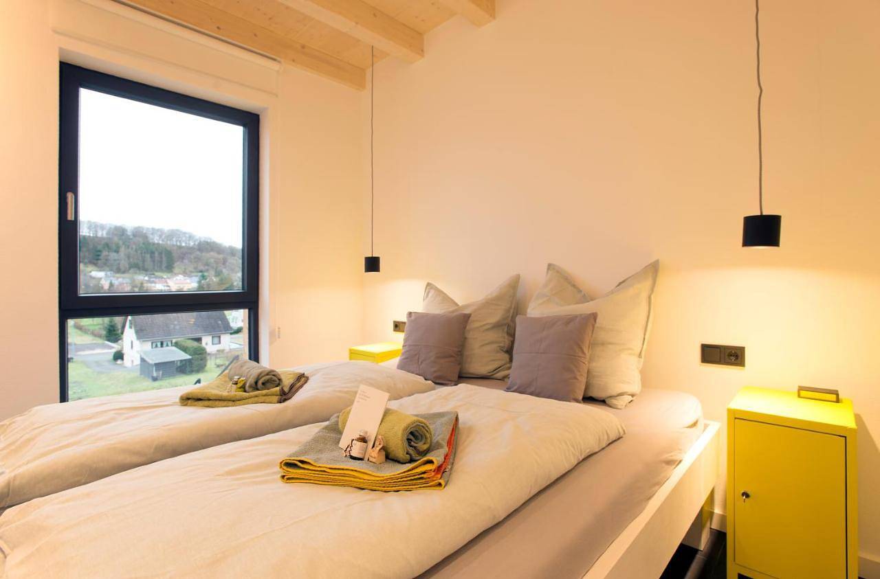Natur und Architektur Eifel - Ferienhaus für Wellness und Yoga - Bio Designhaus mit Sauna im Vulkankrater in Immerath, Vulkaneifel