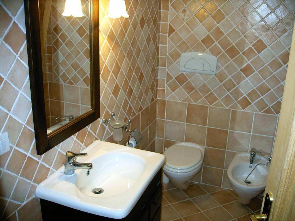 Casa Mughetto R5055 Wifi, seafront, private sea access, swimming pool in Parco Nazionale dell'Arcipelago di La Maddalena, La Maddalena
