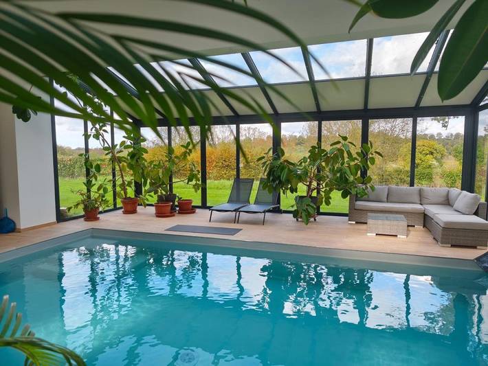 Location de vacances pour 6 personnes, avec piscine ainsi que jardin et vue à Saint-Pierre-Langers