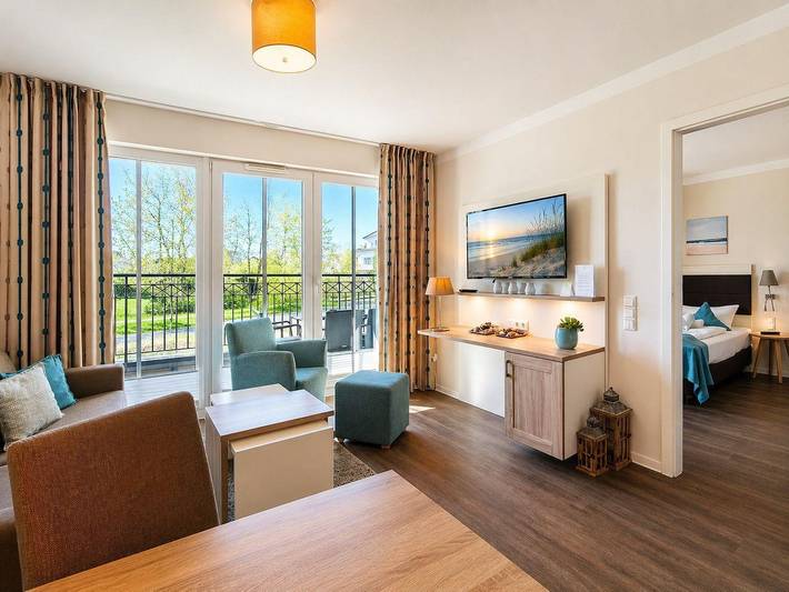 Ferienwohnung für 4 Personen, mit Balkon und Terrasse sowie Pool und Sauna in Börgerende-Rethwisch