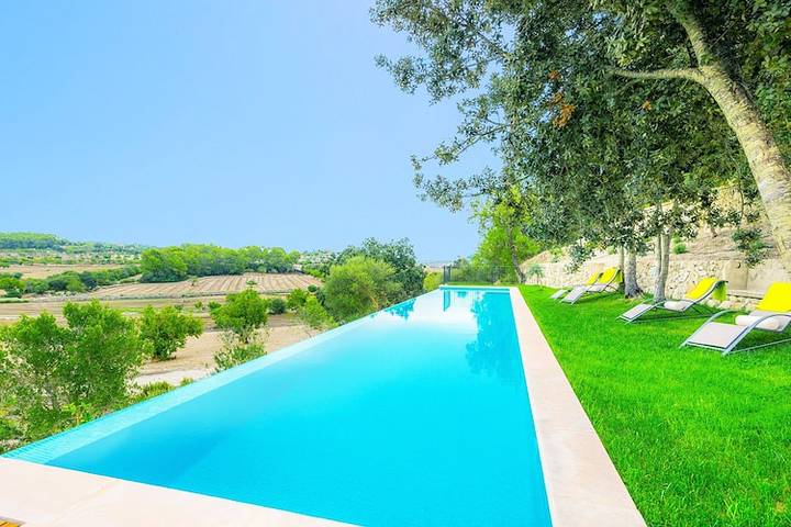 Ferienhaus für 6 Personen, mit Terrasse und Garten sowie Pool in Lloret de Vistalegre