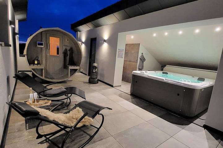 Ferienhaus für 4 Personen, mit Balkon und Garten sowie Sauna und Whirlpool