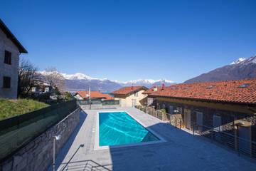 Ferienwohnung für 4 Personen, mit Terrasse und Pool sowie Seeblick, kinderfreundlich in Pianello del Lario