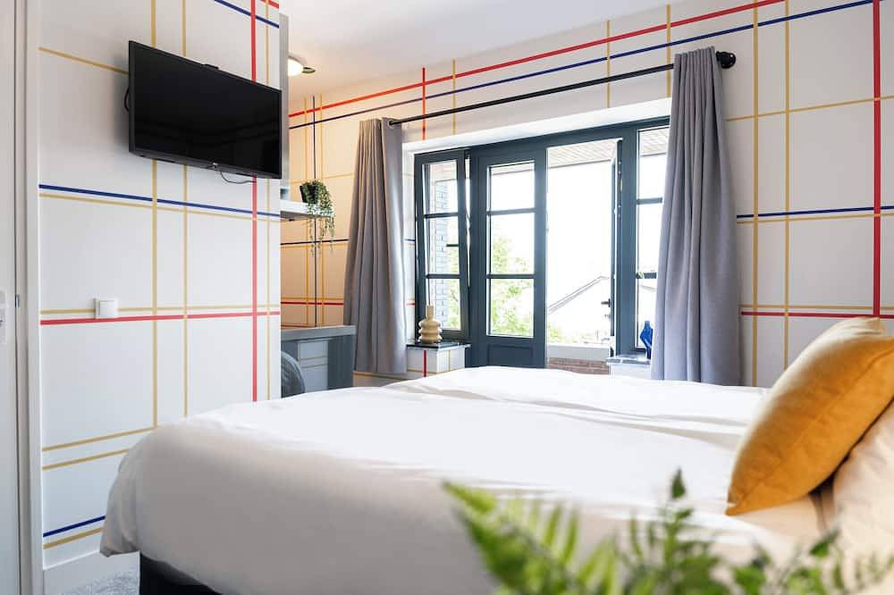 Geheel appartement, Stijlvol appartement met smart Tv, privé keuken, badkamer en balkon in Tilburg, Noord-Brabant