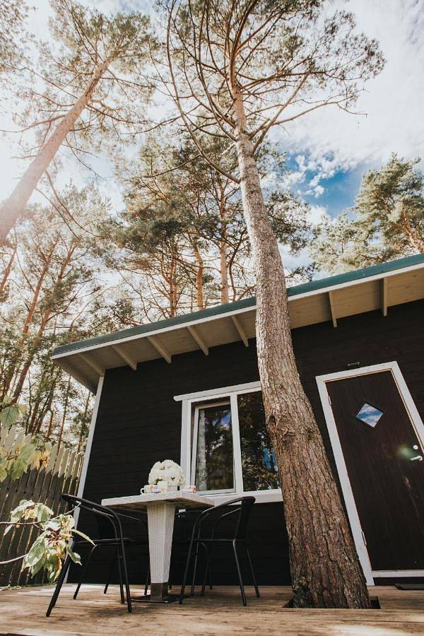 Ferienhaus für 4 Personen, mit Terrasse und Garten sowie Pool und Ausblick in Riga