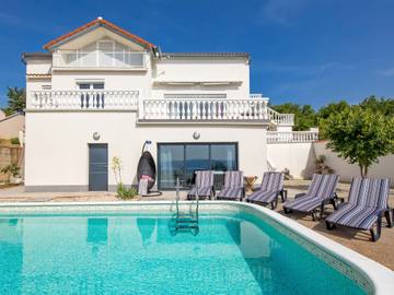 Ferienhaus mit Meerblick für 10 Personen, mit Balkon und Garten sowie Sauna in Kvarner Bucht