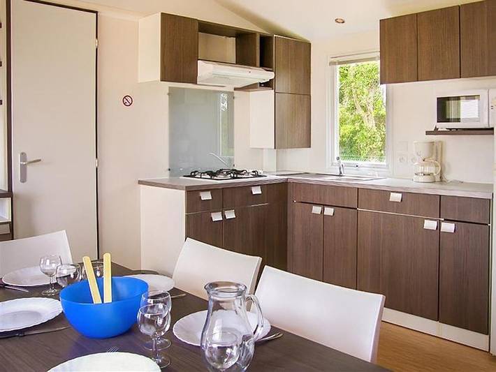 Mobil home pour 6 personnes, avec bassin pour enfant dans Bréhec - 4