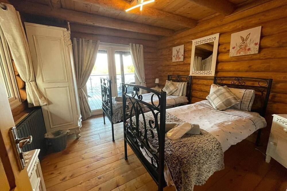 Woodpecker two storey log cabin with a pizza oven,bbq,hot tub, pool table, fishing peg@tattershall in Tattershall, Lincolnshire