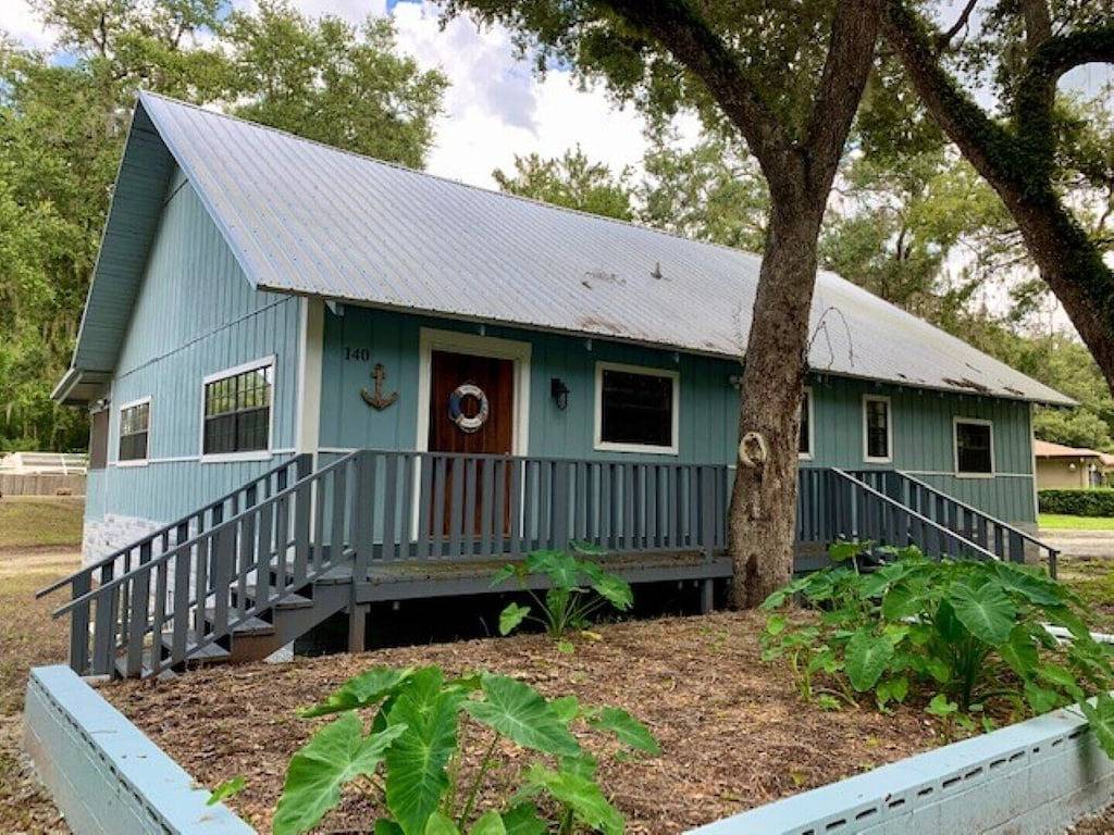 Rustic newly remodeled River House on working fish house property . Gulf access in Inglis, Levy County