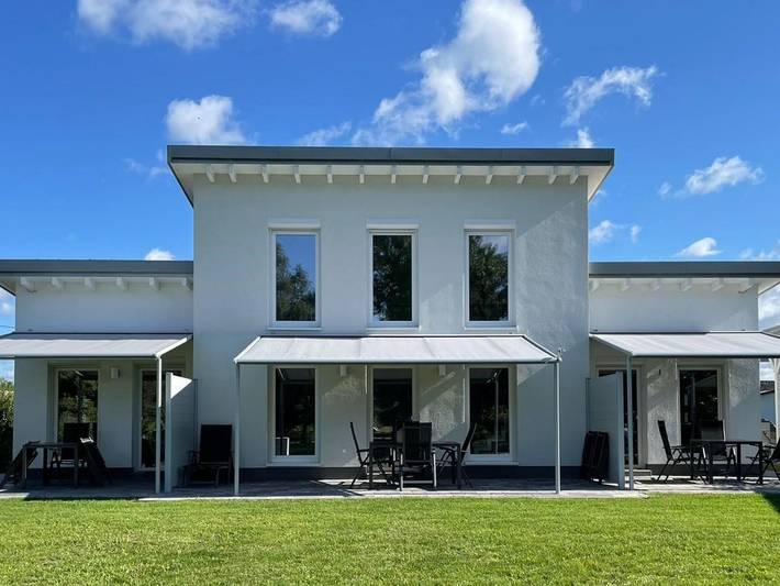 Ferienwohnung für 4 Personen, mit Terrasse und Garten sowie Seeblick in Märkische Heide