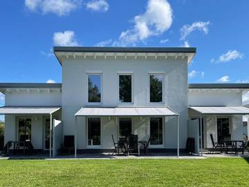 Ferienwohnung für 4 Personen, mit Garten und Seeblick, kinderfreundlich in Märkische Heide