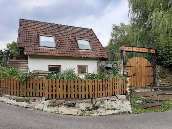 Ferienwohnung für 2 Personen, mit Balkon und Garten sowie Seeblick