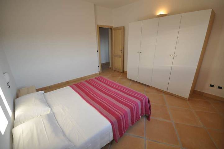 Appartamento intero, Apartment with yard and shared pool, 500m from wonderful white sandy beach in Budoni, Olbia-Tempio