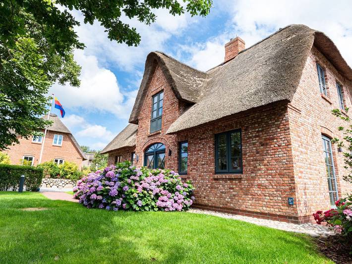 Ferienhaus für 7 Personen, mit Terrasse und Garten in Süderende