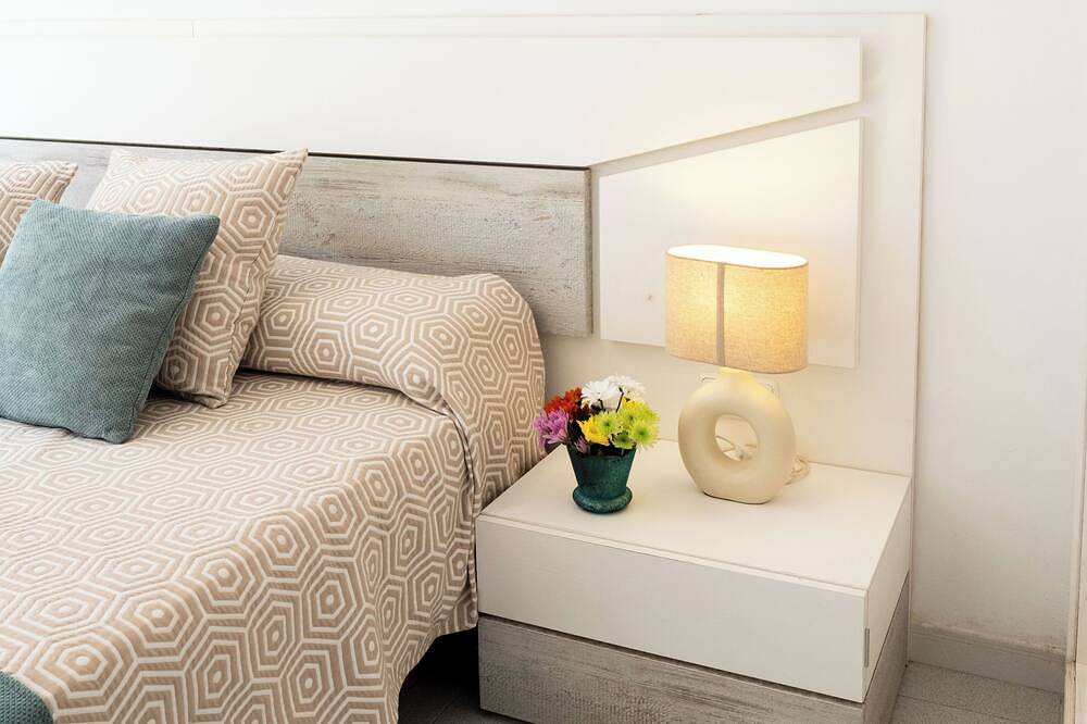 Casa sulla spiaggia, ristrutturata, giardini, barbecue, tranquilla, ideale per famiglie e relax in Playa de Muro, Muro