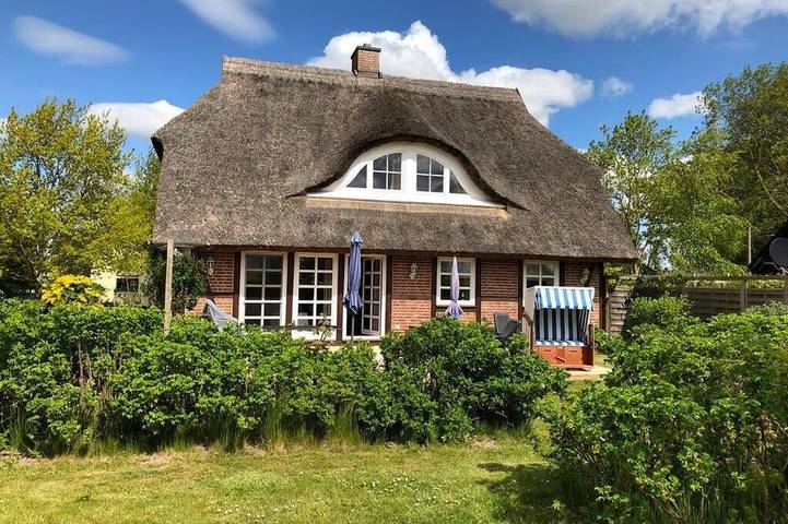 Ferienhaus für 4 Personen, mit Balkon und Garten
