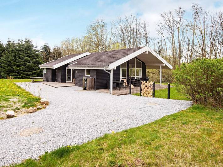 Ferienhaus für 8 Personen, mit Whirlpool und Terrasse sowie Garten und Sauna in Mommark