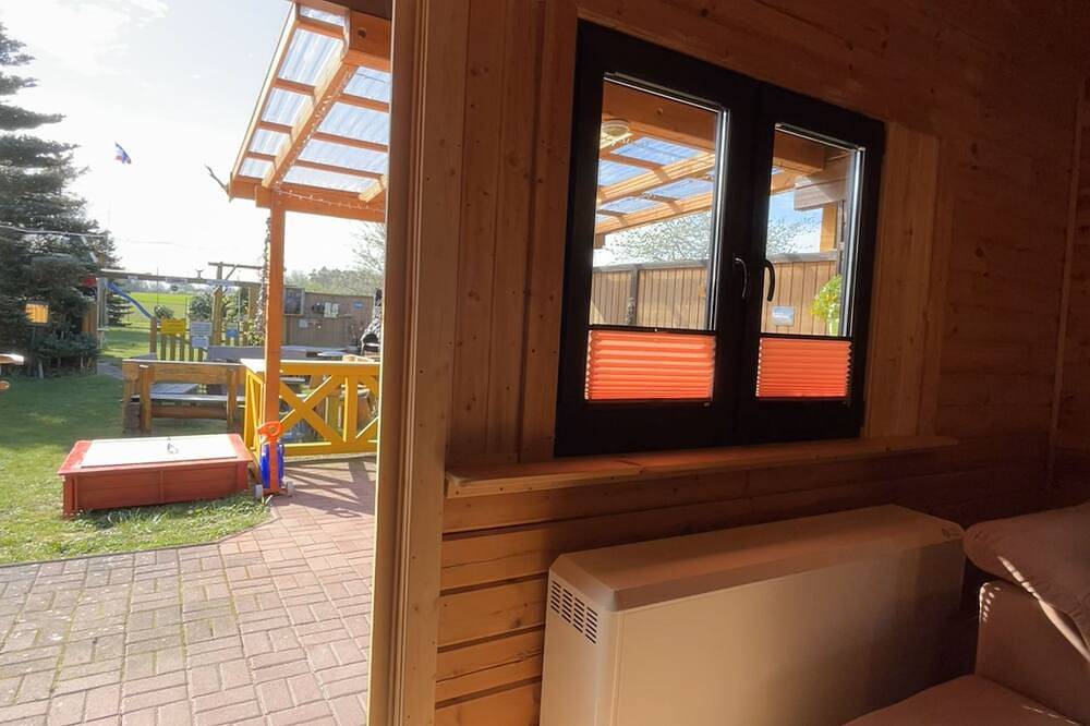 Ganze Wohnung, Holz-Ferienhaus Mechelsdorf nahe Ostseebad Kühlungsborn - 3-Raum-Holzhaus mit in Mechelsdorf, Bastorf