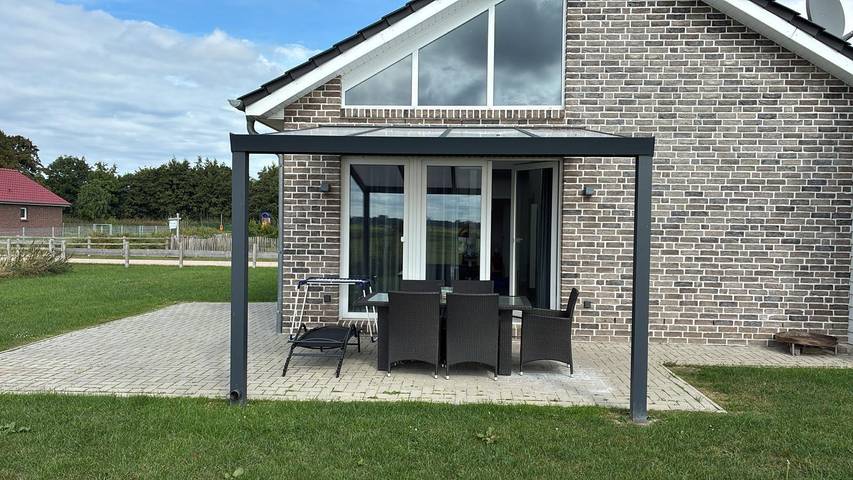 Ferienhaus mit Meerblick für 6 Personen, mit Terrasse und Garten sowie Sauna am Jadebusen