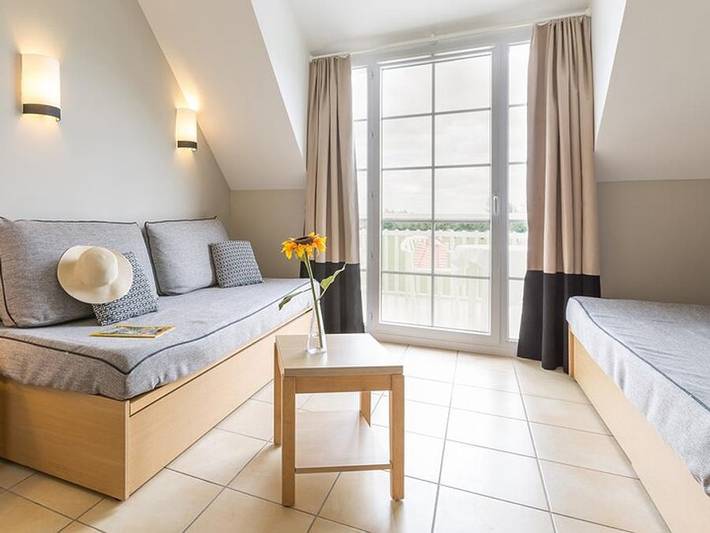 Appartement de vacances pour 5 personnes, avec Balcon ainsi que Bassin pour enfant et Sauna à Port-en-Bessin-Huppain