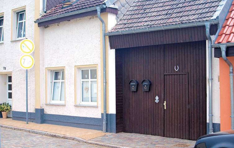 Appartement de vacances entier, Appartement moderne avec terrasse, WiFi et parking, à 100 m de la côte in Lassan, Vorpommern Greifswald