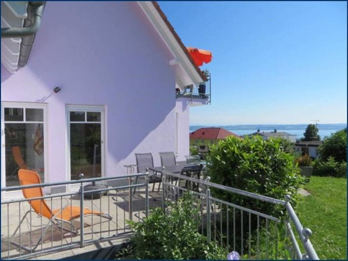 Ferienwohnung für 6 Personen, mit Terrasse und Garten sowie Seeblick und Ausblick
