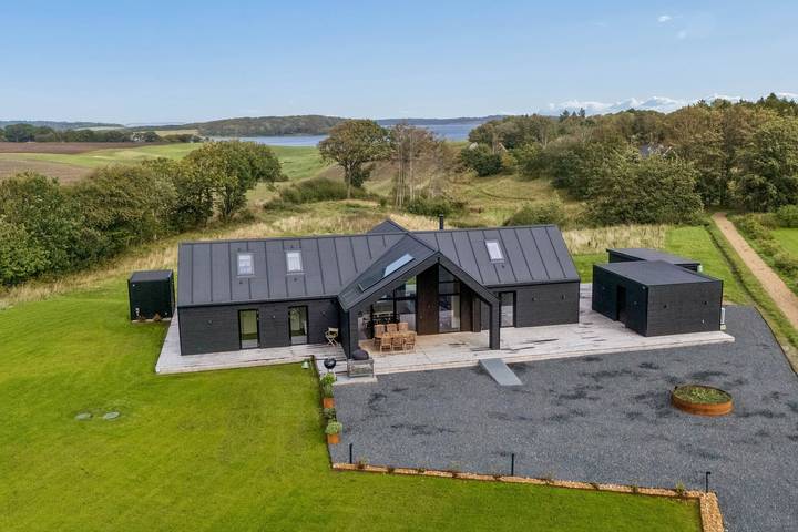 Ferienhaus für 8 Personen, mit Terrasse und Garten sowie Sauna und Ausblick in Astrup Vig