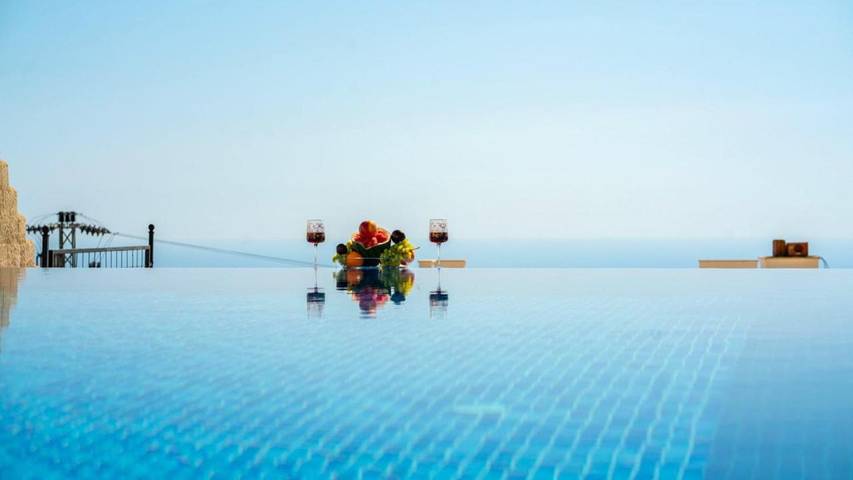 Villa pour 2 personnes, avec sauna et jacuzzi ainsi que piscine et bassin pour enfant à Kalkan