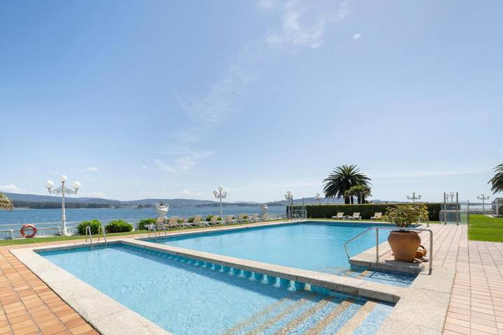 Apartamento para 2 personas, con piscina y vistas además de jardín y sauna en Isla de La Toja