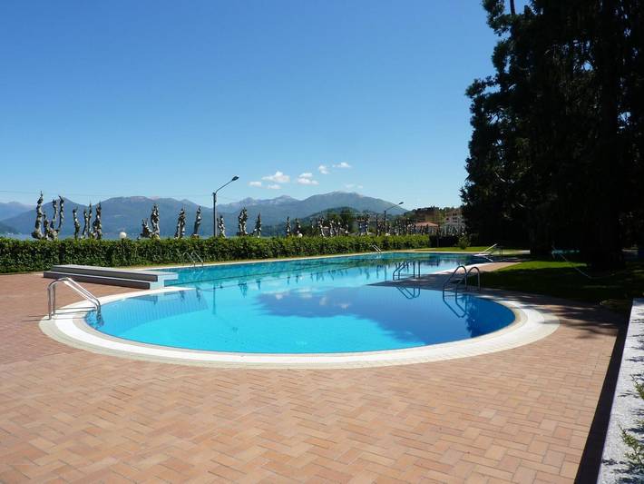 Gîte pour 4 personnes, avec jardin ainsi que bassin pour enfant et balcon à Porto Valtravaglia