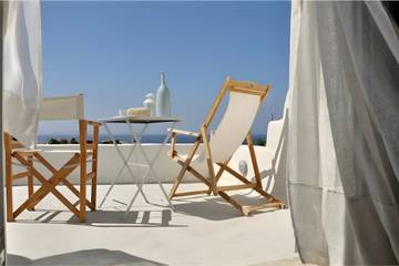 Location de vacances pour 2 personnes, avec balcon et jardin dans Tinos