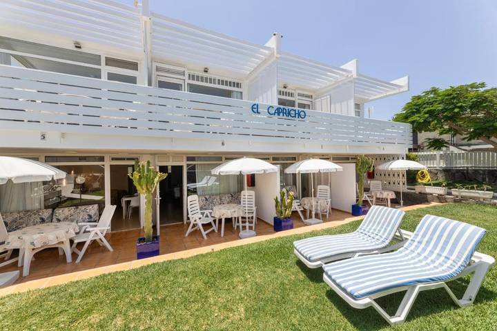 Ferienwohnung für 3 Personen, mit Balkon und Terrasse sowie Garten und Seeblick in Meloneras
