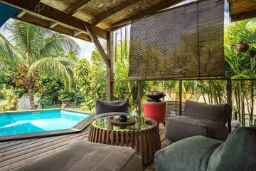 Cottage pour 4 personnes, avec jardin et piscine à Le Moule
