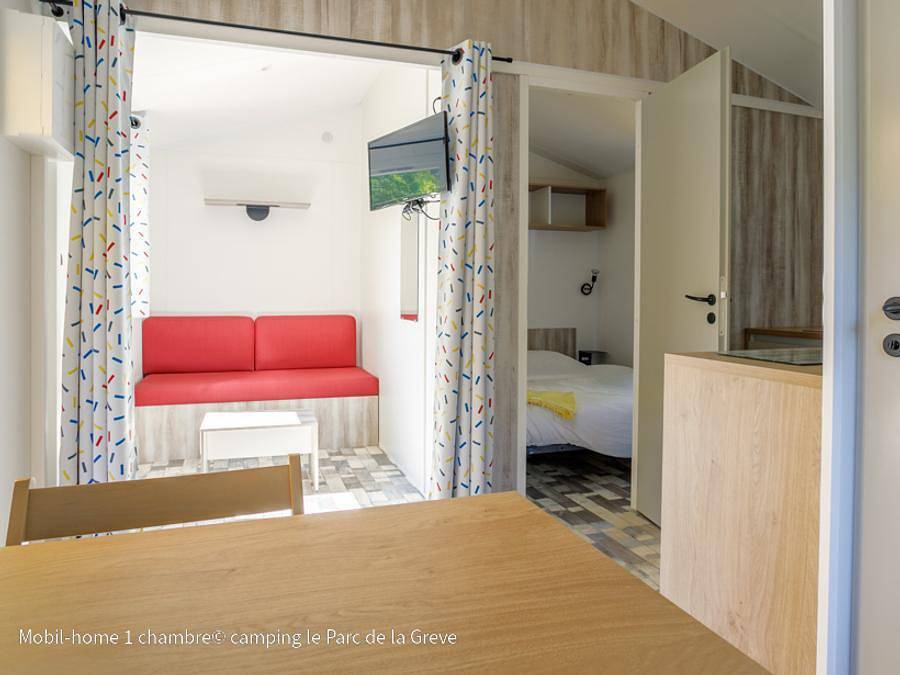 Camping Ushuaïa Villages Le Parc de la Grève - Mobile home 2 persons - Home Confort 1bed (classic range) in L'Aiguillon-sur-Vie, Loire Valley