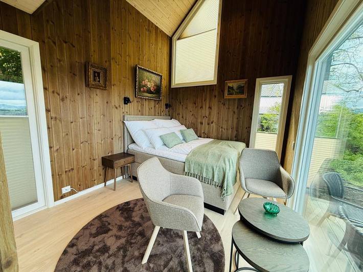Ferienhaus für 4 Personen, mit Whirlpool und Terrasse sowie Garten und Sauna in Gurskøy - 4