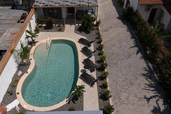 Ferienhaus für 4 Personen, mit Terrasse und Garten sowie Pool und Ausblick in Tolo