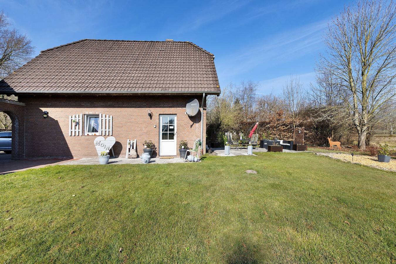 Ferienhaus 'Harmonie' mit privater Terrasse, Wlan und Deckenventilator in Südbrookmerland, Landkreis Aurich
