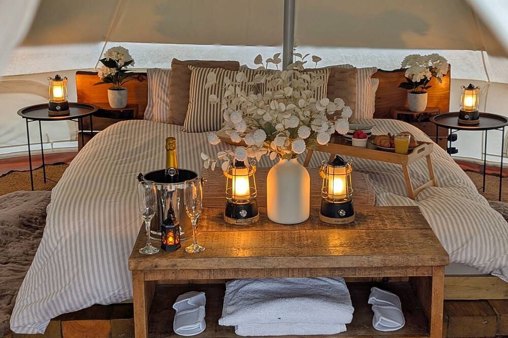Bell tent in ultimate luxury with a wood fired hot tub, super king size bed in Stafford, Staffordshire