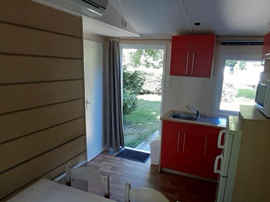 Camping Le Saulou - Mobile home 4 persons - Mh B 4 P with sanitary facilities in Monceaux-sur-Dordogne, Tulle region